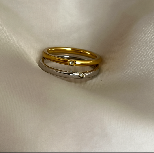Two  rings with embedded diamonds 